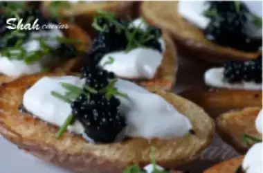 Baked potatoes with sour cream and caviar